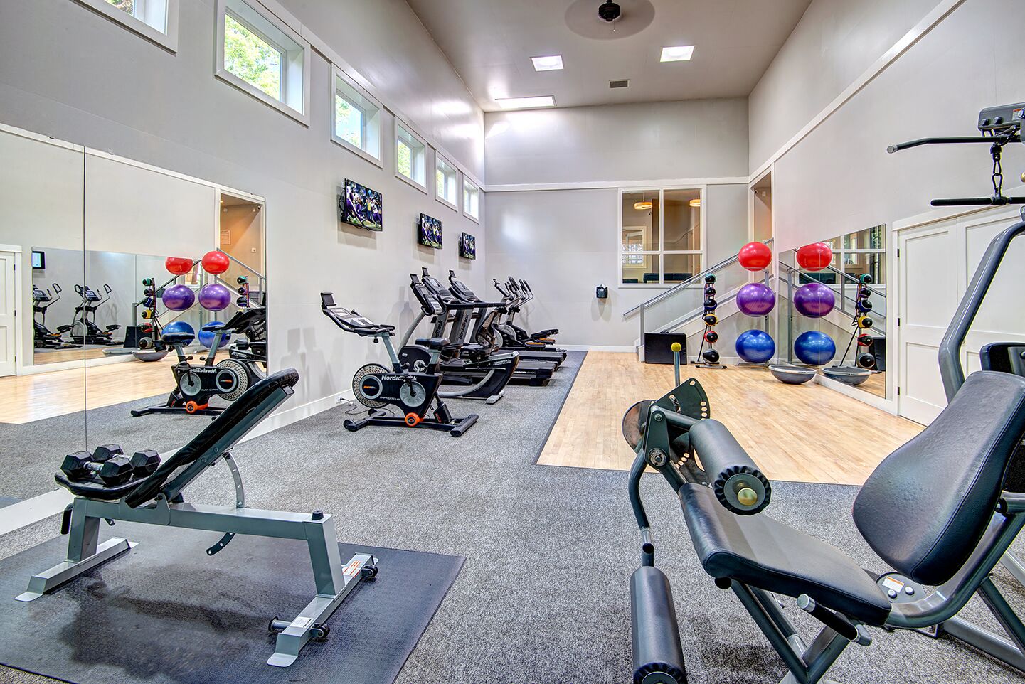 The Reserve at Bucklin Hill gym with treadmill work out balls and weights